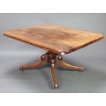 A Victorian bleached mahogany snap top breakfast table, raised on a turned column and tripod base