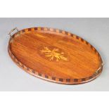 An Edwardian oval inlaid mahogany twin handled tea tray 3cm x 60cm w x 37cm d Split to top and small