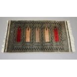 A Bokhara rug with 5 panels decorated mosque lamp and signed 164cm x 100cm