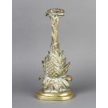 A Victorian style brass door stop in the form of a pineapple 35cm x 15cm x 7cm