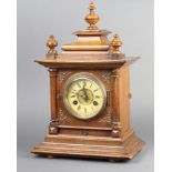 J Unghans, a Victorian 8 day striking bracket clock with paper dial and Roman numerals, contained in