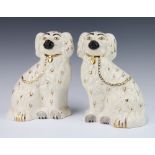 A pair of Beswick Victorian style Staffordshire spaniels 1378/3 with gilt decoration 25cm