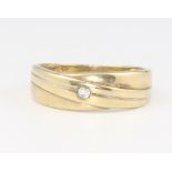 A 9ct yellow gold diamond set ring, size T, 3.3 grams