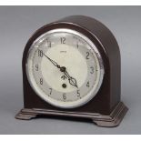 Smiths, a 1930's war office issue mantel clock, the 15cm silvered dial with Arabic numerals