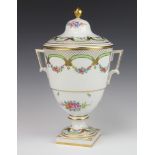 A 20th Century Dresden porcelain 2 handled vase and cover decorated with floral swags 39cm