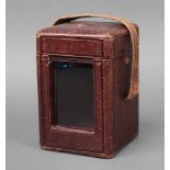 A 19th Century red leather repeating carriage clock case, the base marked 13,069, inside measurement