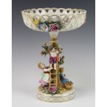 A 20th Century German porcelain centrepiece with pierced and applied floral decoration, the base