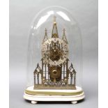 A Victorian fusee skeleton clock in the form of a cathedral front with 14cm silvered dial and