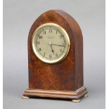 An Edwardian 8 day timepiece, the 9cm silvered dial marked A L Canham & Son London North West 1,