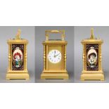 A 19th/20th Century French 8 day carriage clock, striking on a gong contained in a gilt metal and