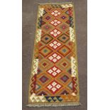 A tan, white and green ground Maimana Kilim runner 199cm x 68cm