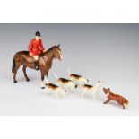 A Beswick figure "Huntsman" style 2, model no. 1501 brown gloss with red jacket, modelled by
