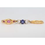 A 22ct yellow gold wedding band, size N, 2.2 grams, a 22ct gold Victorian ruby 3 stone ring size R