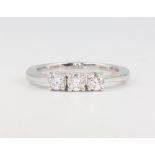 An 18ct white gold 3 stone brilliant cut diamond ring, approx. 0.5ct, size N, 5 grams