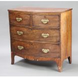 A Georgian mahogany bow front chest with crossbanded top, fitted 2 short and 2 long drawers with