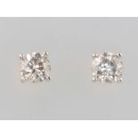 A pair of 18ct white gold single stone diamond ear studs approx. 1.11ct, 2.1 grams