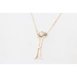 A 9ct yellow gold pearl pendant and chain 1.5 grams