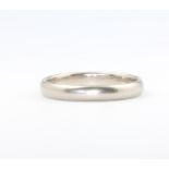 An 18ct white gold wedding band, 2.7 grams, size N 1/2