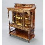 A Victorian inlaid rosewood display cabinet, the raised back enclosed by a bevelled glazed