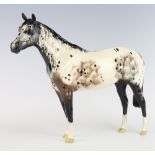 A Royal Doulton figure of a mottled race horse 21cm