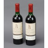 Two bottles of 1971 Chateau Latour Grand Vin, imported by Douglas Ashby & Co The wine is slightly
