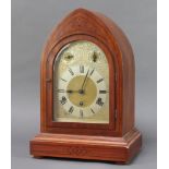 An early 20th Century German striking on gong bracket clock, the 20cm arched dial with Roman