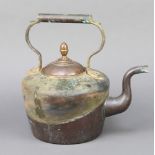 A 19th Century circular copper kettle with acorn finial 30cm x 6cm The kettle is showing signs of