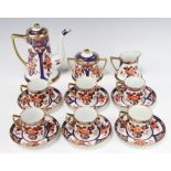 An Art Deco Noritake coffee set comprising tapered teapot, milk jug, sugar bowl and cover, 6 cups