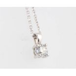 An 18ct white gold brilliant cut diamond pendant and chain, approx. 0.51ct, the chain is 44cm and