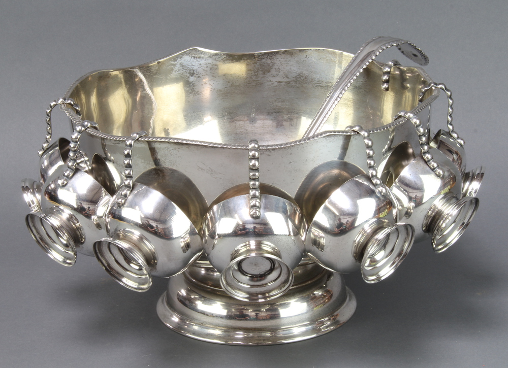 A plated pedestal punch bowl, ladle and 8 cups