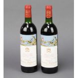 Two bottles of 1981 Chateau Mouton Rothschild Pauillac The wine is just to the bottom of the neck