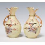 A pair of Royal Worcester Lock & Co urns decorated with birds no.456 14cm
