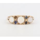 A Victorian style 9ct yellow gold opal and sapphire ring, size M, 2.6 grams One sapphire is missing