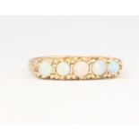 A Victorian style 9ct yellow gold 5 stone opal ring, 2 grams, size N