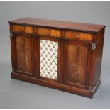 A Georgian style crossbanded mahogany sideboard fitted 3 drawers above triple cupboard, the centre