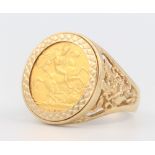 A 1907 half sovereign contained in a 10 gram 9ct yellow gold ring mount