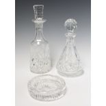 A Waterford Crystal decanter and stopper 32cm, ditto 27cm together with an ashtray 15cm