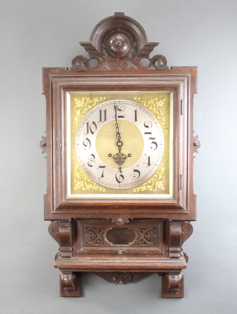 A 19th Century Continental 8 day striking wall clock, the 30cm dial with silvered chapter ring,