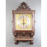 A 19th Century Continental 8 day striking wall clock, the 30cm dial with silvered chapter ring,