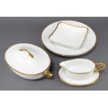 A Rosenthal dessert service with gilt rims comprising 21 dinner plates, 6 side plates, 6 small