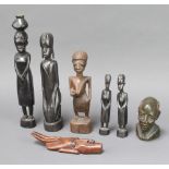A carved African hardwood figure of a standing lady 33cm x 4cm x 4cm, 4 ditto figures of ladies,