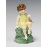 A Royal Worcester figure - Friday's child is loving and giving 15cm