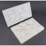 A plaster wall plaque of cavorting cherubs 25cm x 35cm, a ditto 23cm x 41cm