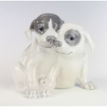 A Royal Copenhagen group of 2 puppies no.126 16cm