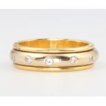 An 18ct yellow gold diamond set eternity ring, size K, 6.2 grams