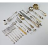 A silver lily pattern sifter spoon Sheffield 1912, 6 small forks, spoons etc, weighable silver 240