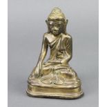 A Chinese gilt bronze figure of a seated Buddha 15cm x 9cm x 6cm