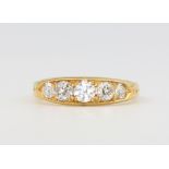 A 15ct yellow gold 5 stone diamond ring of Edwardian style approx. 0.75ct, size M 1/2, 2.5 grams