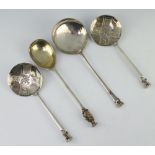 A pair of Edwardian silver apostle spoons London 1904 and 2 others, 302 grams