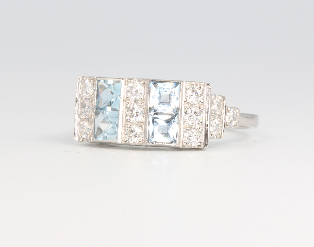 A platinum princess cut aquamarine and diamond ring in the Art Deco style, approx. 4 grams, size O